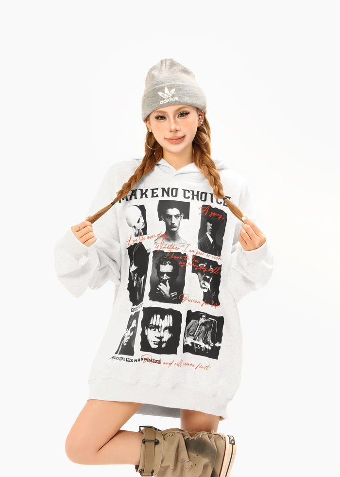White collage graphic hoodie worn by model holding braids, front view