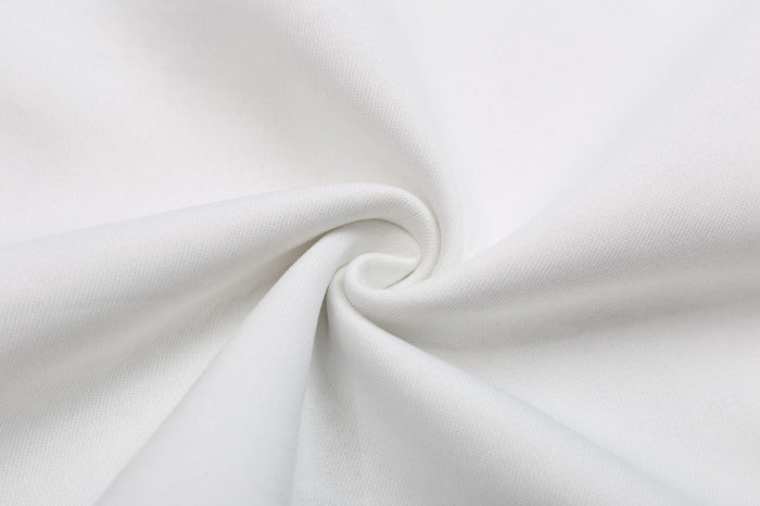 Close-up of ash grey cotton fabric texture folded in a spiral