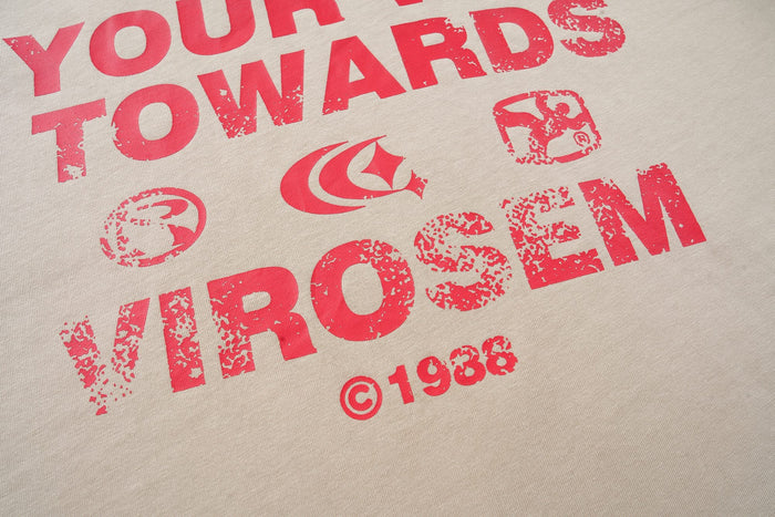 Cream streetwear T-shirt with bold distressed red graphic text and logo print across the chest