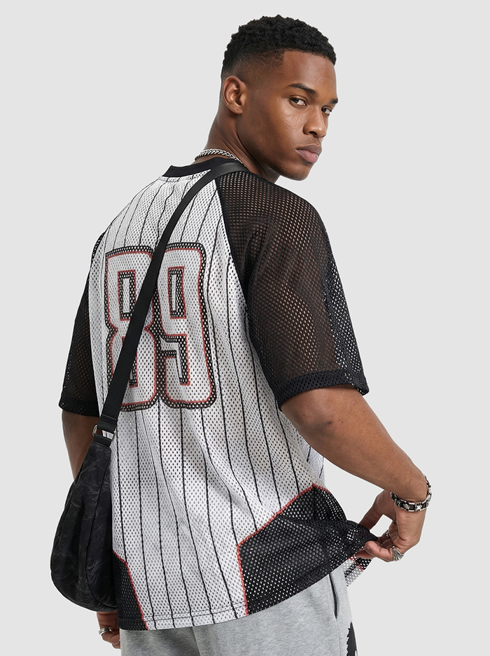 Back view of a black and white mesh jersey T-shirt with pinstripes and bold 89 graphic on the back