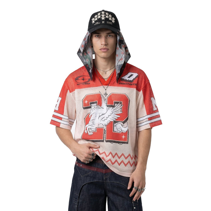 Model wearing a red and white mesh jersey T-shirt with a large number 22 graphic, black cap, and wide-leg jeans