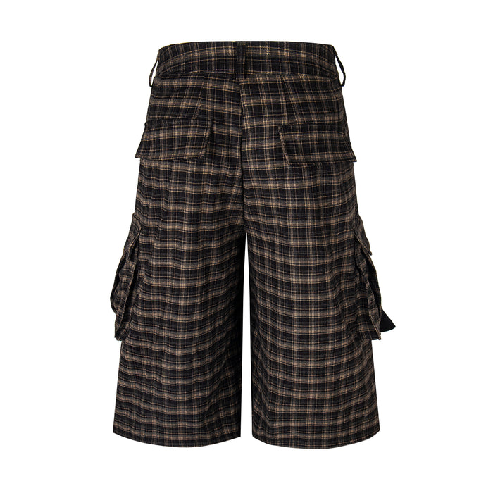 Back view of plaid knee-length cargo shorts with elastic waistband and back flap pockets