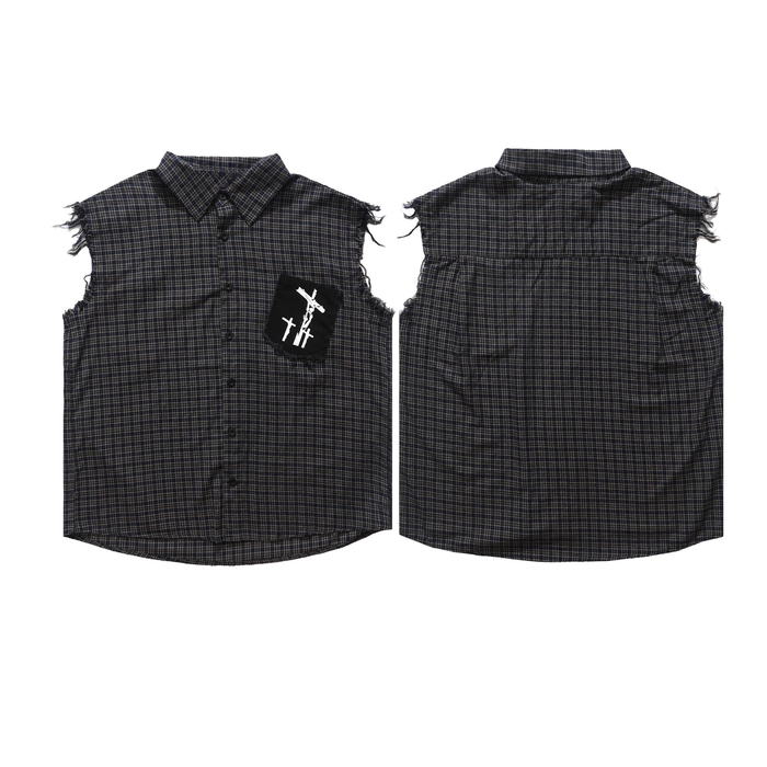 Dark plaid raw-edge sleeveless cotton shirt with frayed armholes and a black three-cross graphic chest patch, front view
