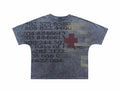 Vintage wash oversized graphic tee in faded gray with Rays of Hope text, numbers, and red cross print