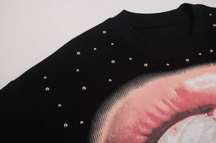 Black oversized T-shirt with rhinestone detailing and pink lip graphic on the chest