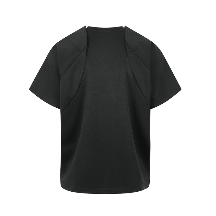 Matte black oversized tech T-shirt with structured panels and short sleeves, shown front view on white background