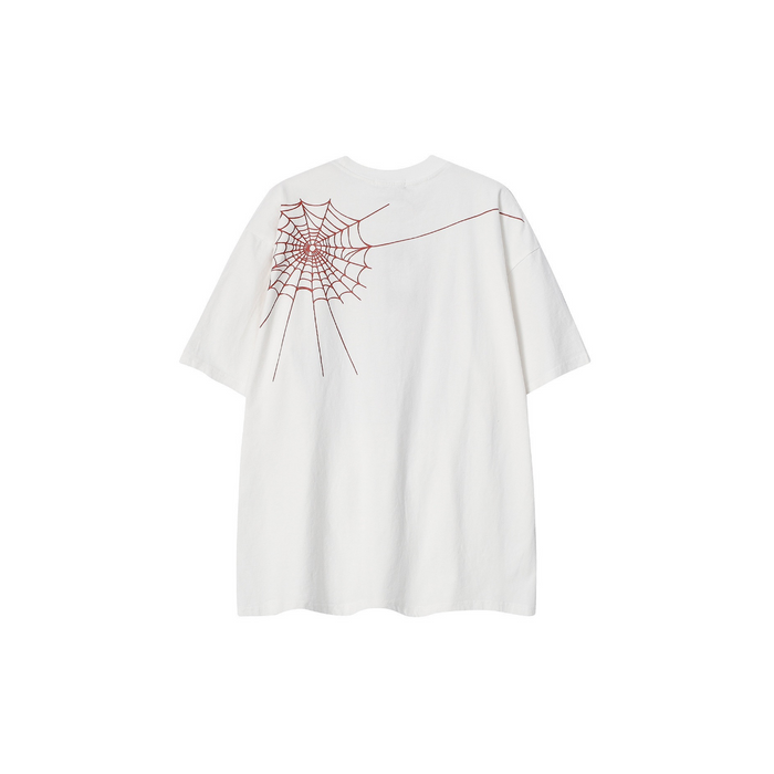 White oversized streetwear tee with a red spider web graphic across the upper back