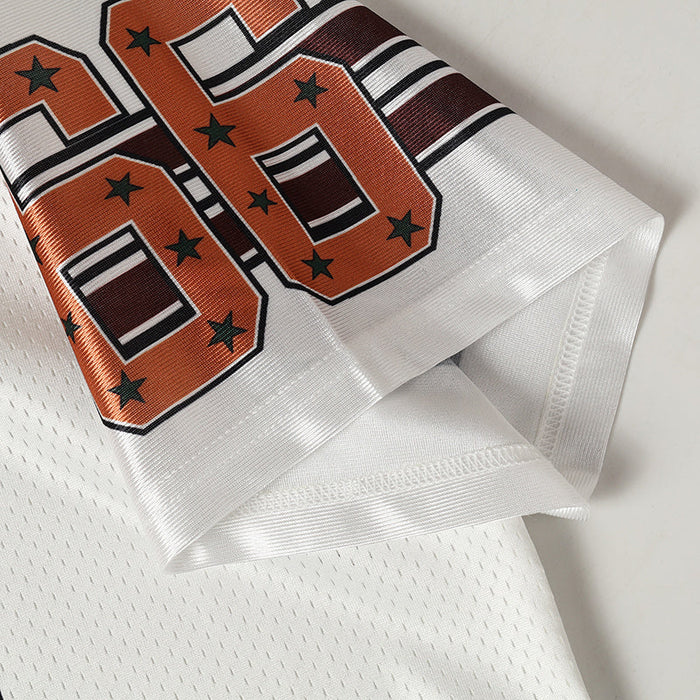 White mesh varsity jersey sleeve with orange star graphic and striped number detail