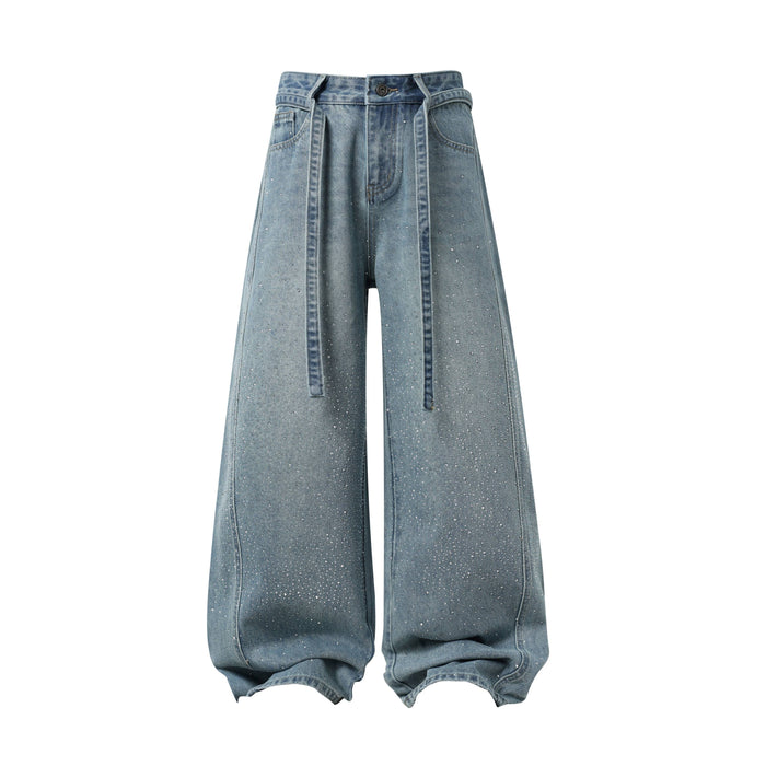 Front view of light blue wide-leg jeans with rhinestone speckles and long belt ties
