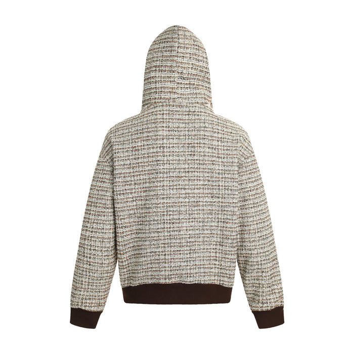 Back view of a textured boucle knit hoodie in beige and brown with dark rib trim