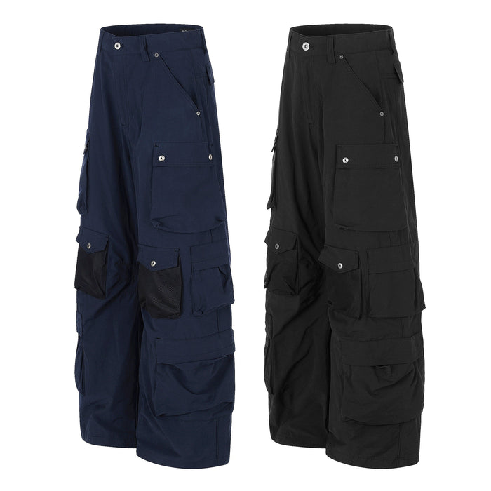 Wide-leg cargo pants in navy and black shown side by side, front view with flap pockets