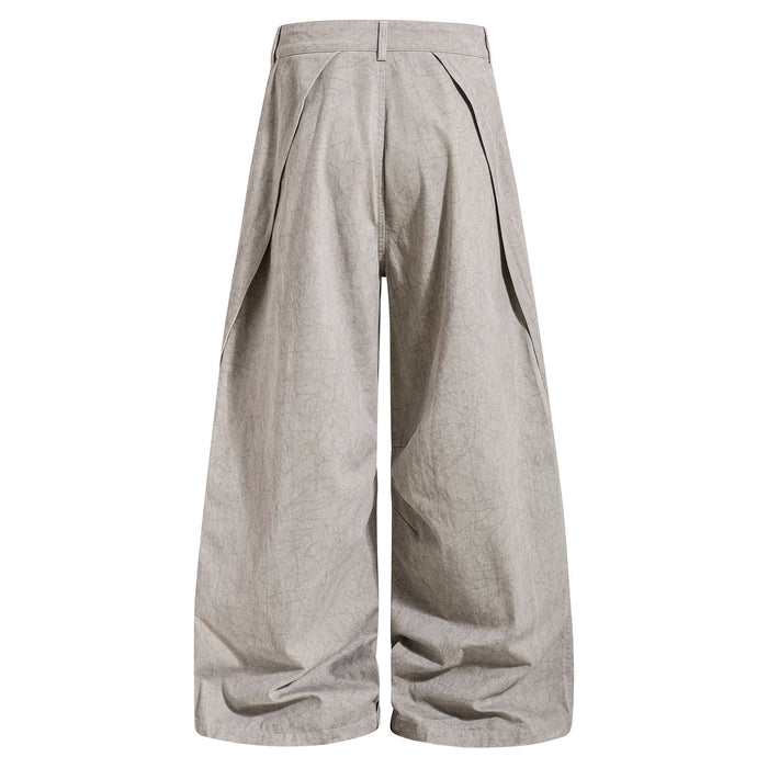 Light beige washed denim jeans back view with oversized wide legs and back yoke seams
