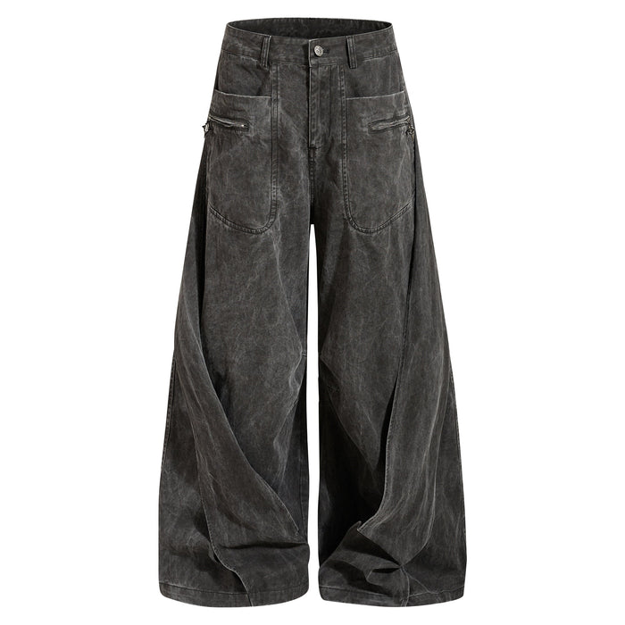 Dark charcoal washed denim jeans front view with wide legs and zipper cargo pockets