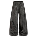 Dark charcoal washed denim jeans front view with wide legs and zipper cargo pockets