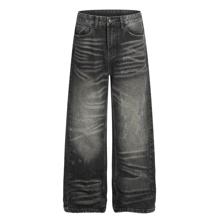 Straight front view of black washed wide-leg jeans with five pockets and distressed markings
