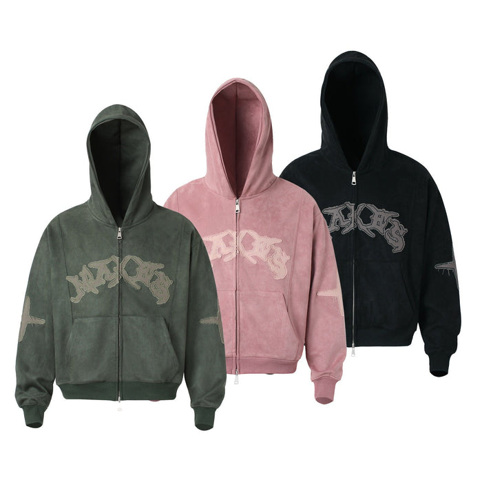 Three washed zip-up hoodies in dark green, pink, and black with gothic logo