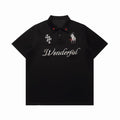 Black embroidered gothic polo shirt with white Wonderful script, red star collar accents, and cross and rider chest designs