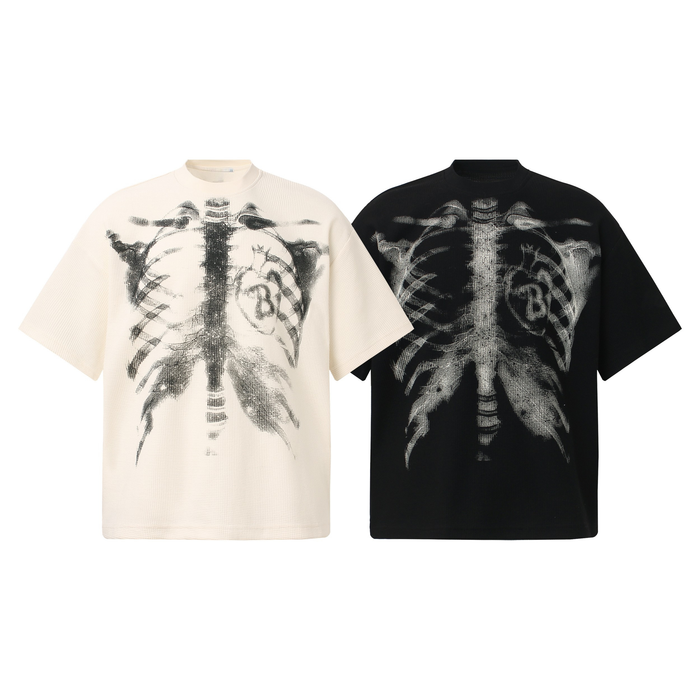 Omirad X-Ray Ribcage Graphic Tee in off-white and black showing full-chest skeletal ribcage print on waffle-knit fabric