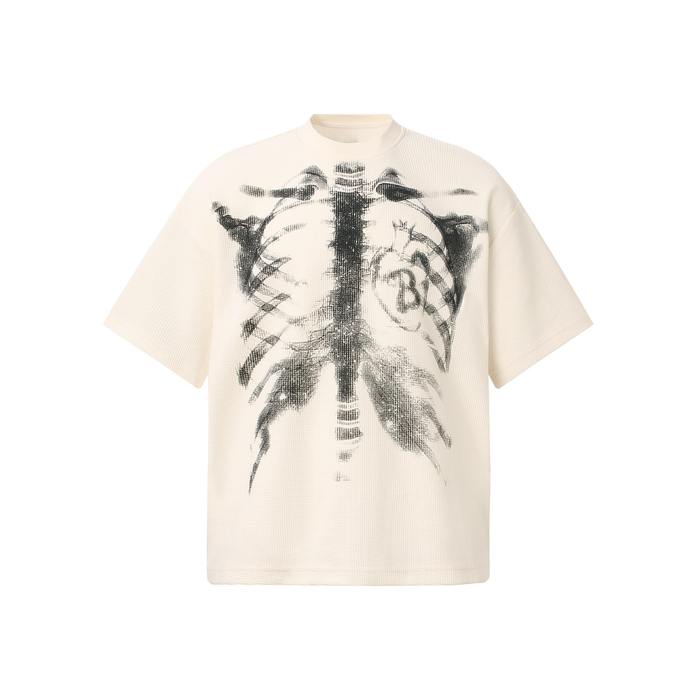 Cream short-sleeve tee with bold black ribcage skeleton print on the front, featuring a streetwear-inspired graphic design
