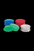 A close-up shot of the Acrylic 2-Piece Grinder in translucent colors, arranged to showcase its two-part design.