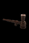 A side view of the Wooden "Hukka" Pipe with a stone bowl insert, showing its detailed wooden carving and dark finish.