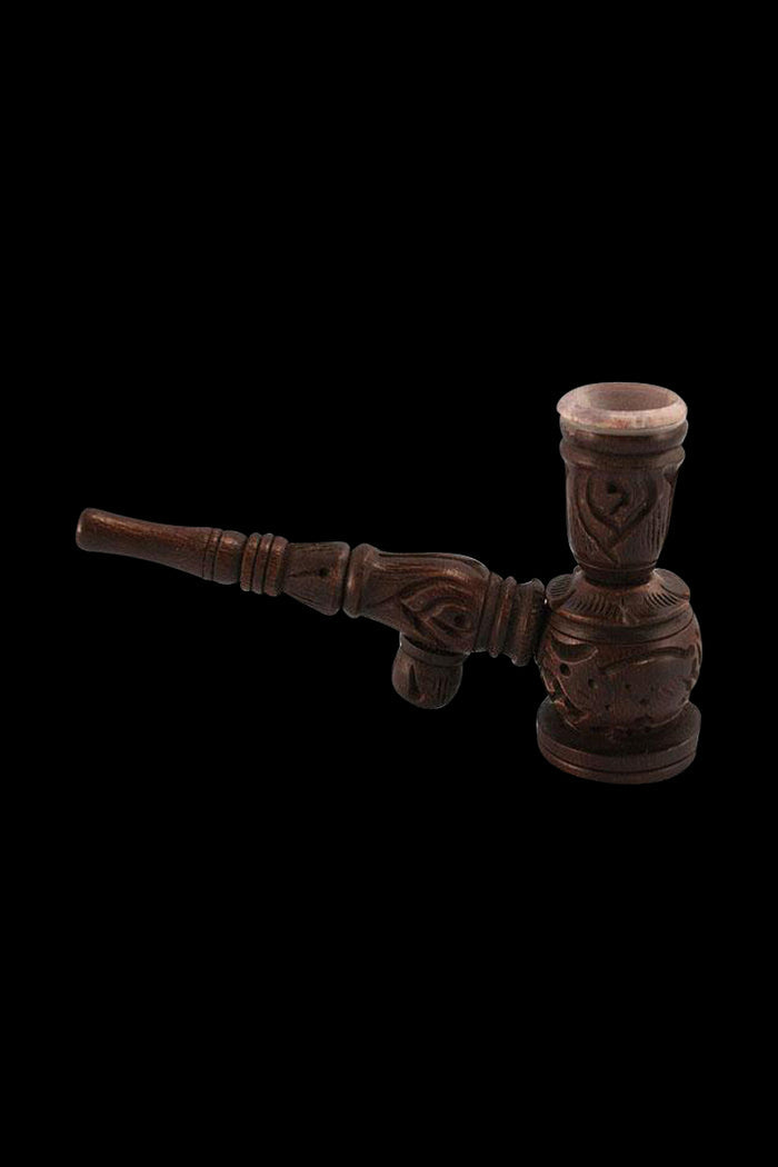 A side view of the Wooden "Hukka" Pipe with a stone bowl insert, showing its detailed wooden carving and dark finish.