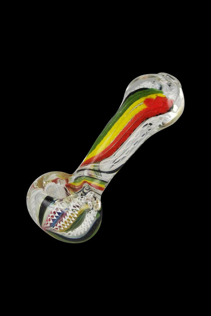 A side view of the Worked Rasta Hand Pipe, showcasing the red, yellow, and green glass design.
