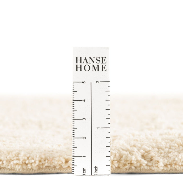 Hanse Home rug with a ruler for scale on a white background