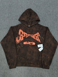 Sp5der brown tie-dye pullover hoodie with orange graphic logo print on the chest