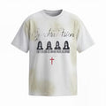 Washed white distressed graphic tee with faded black print, four face portraits, and a small red cross