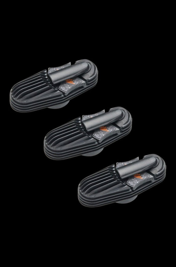 A close-up, angled view of the Storz & Bickel Mighty Cooling Unit Set, showcasing the gray, ribbed texture of the components.