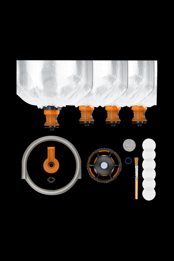 A top-down view of the Volcano Hybrid Starter Set, displaying multiple clear glass bags arranged in a row on a black background.