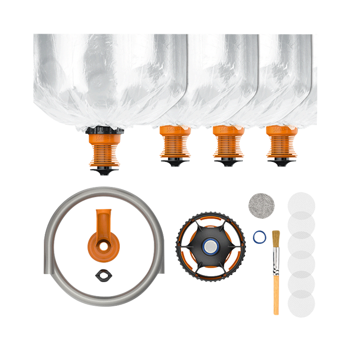 A top-down view of the Volcano Hybrid Starter Set components arranged against a white background, including various clear glass parts and connectors.