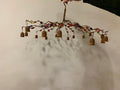 Small hanging beaded chandelier with bells