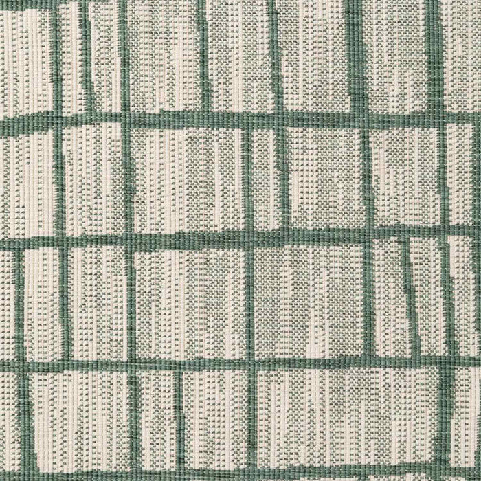 Textured fabric pattern with green and beige checkered design