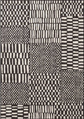 Black and white geometric patterned rug