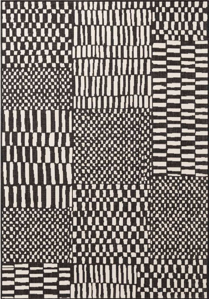 Black and white geometric patterned rug