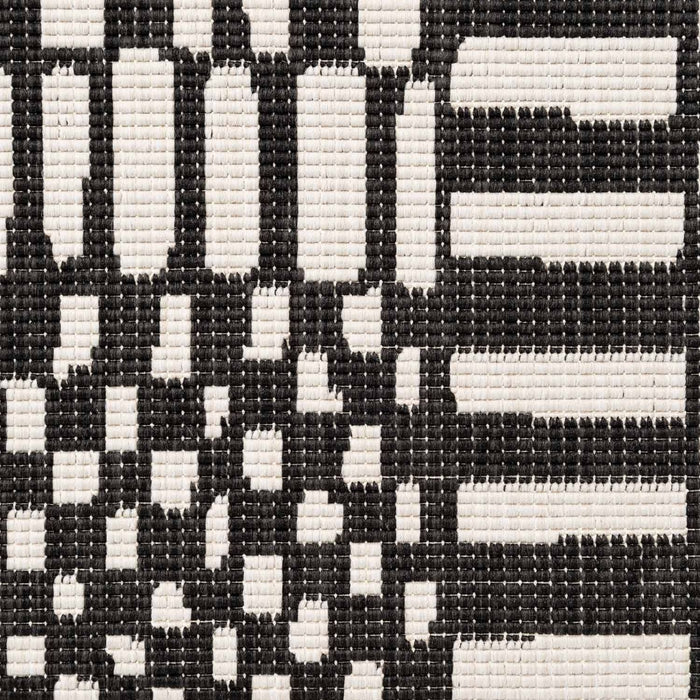 Close-up of a black and white geometric patterned fabric