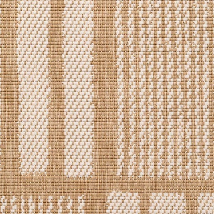 Close-up of a woven fabric with beige and white pattern
