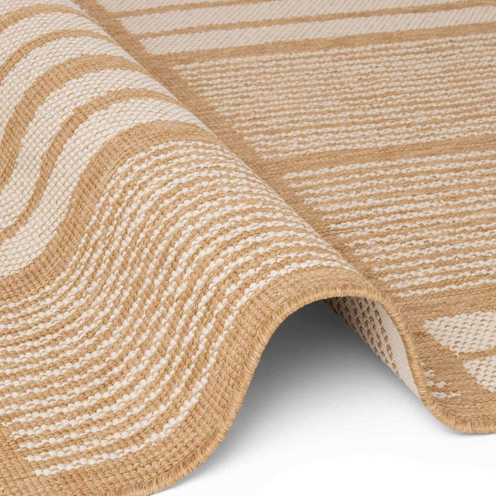 Close-up of a beige and white striped rug on a white background