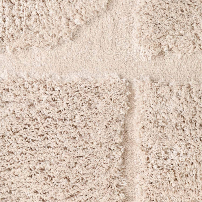 Close-up of beige carpet texture