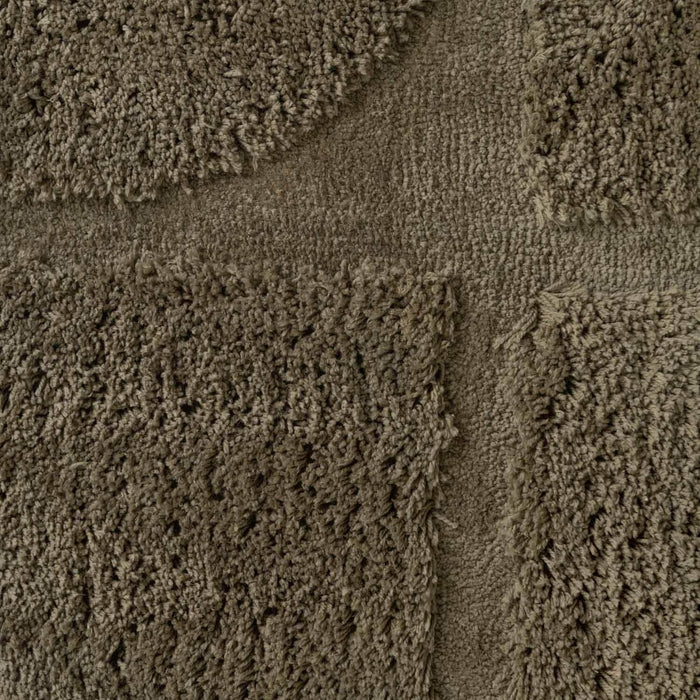 Close-up of textured brown carpet