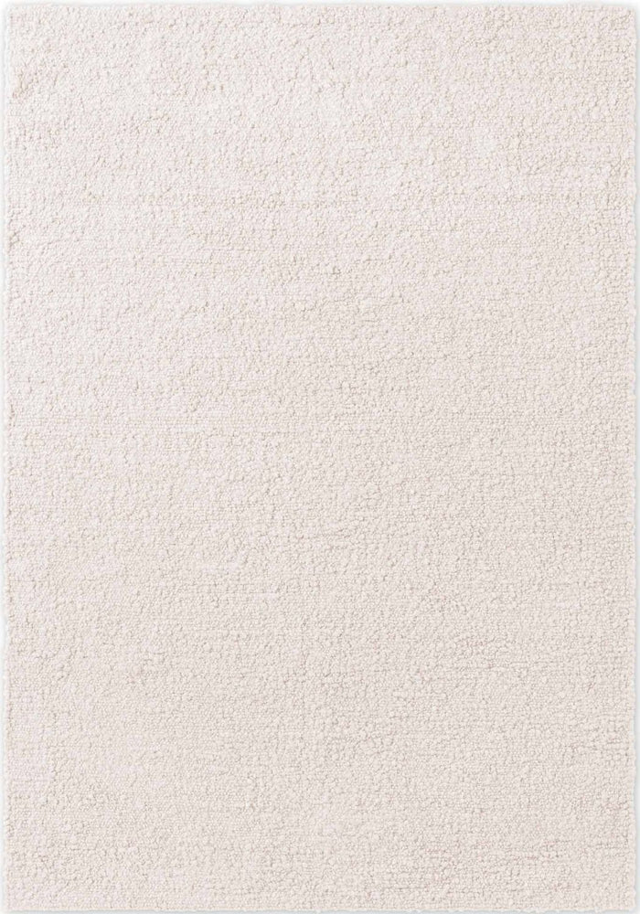 Beige rug with a subtle pattern on a white background