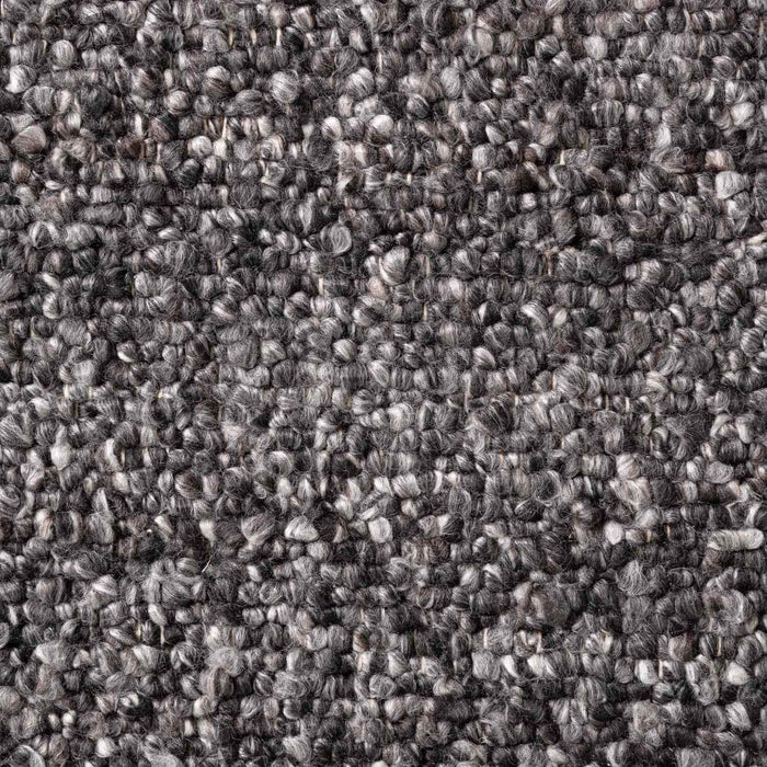 Close-up of a textured gray fabric surface