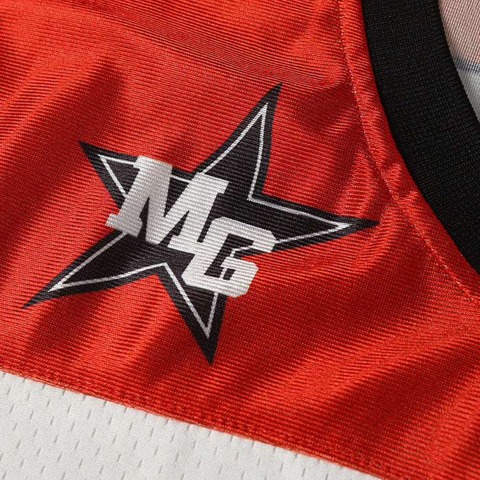 Red varsity football jersey with a bold star graphic and white mesh trim, featuring MG lettering on the chest