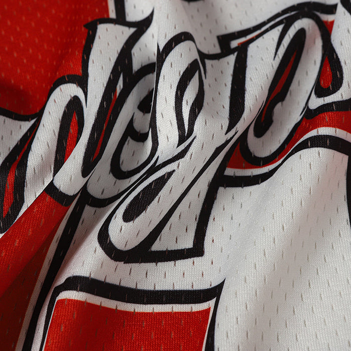 Close-up of a white and red varsity football jersey with bold black outlined number 03 mesh fabric details