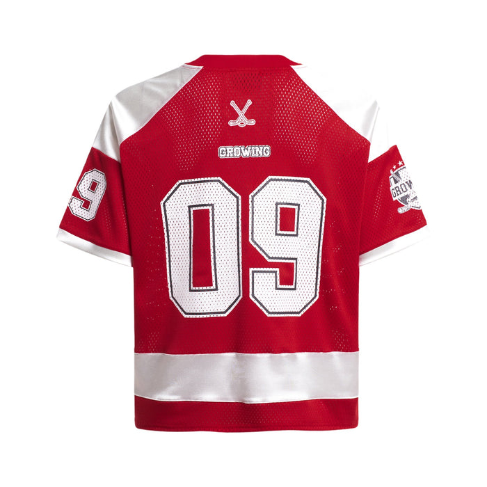 Red varsity mesh hockey jersey with number 09, white shoulder panels, and streetwear graphic details on back