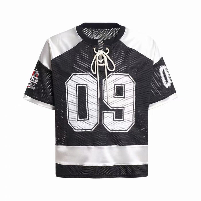 Black and white mesh hockey jersey T-shirt with lace-up collar and oversized number 09 graphic