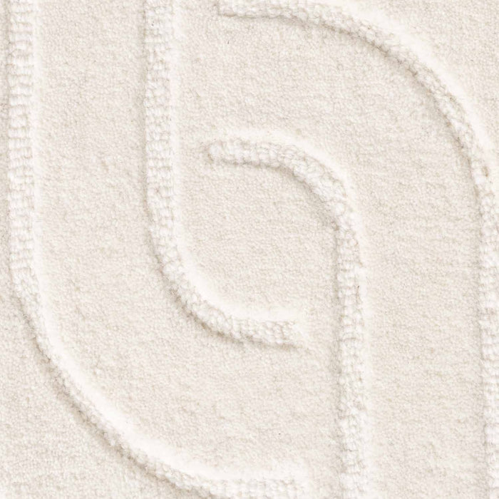 Close-up of a textured white yarn swatch