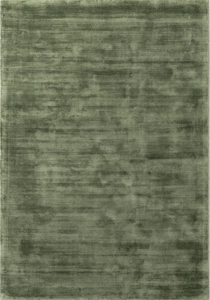 Green textured rug with abstract pattern